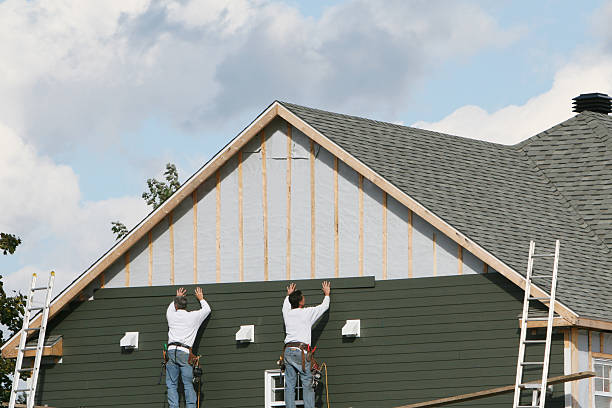 Professional Siding Replacement technician working in Painesville, OH